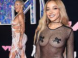 Битва за образы X-RATED на MTV VMA 2023: Доджа Кэт рискует сломать гардероб в ОЧЕНЬ откровенном платье-паутине, в то время как Тинаше ЗАКЛИНЫВАЕТ свои интимные места, пока они возглавляют дикие наряды на грандиозном музыкальном вечере
